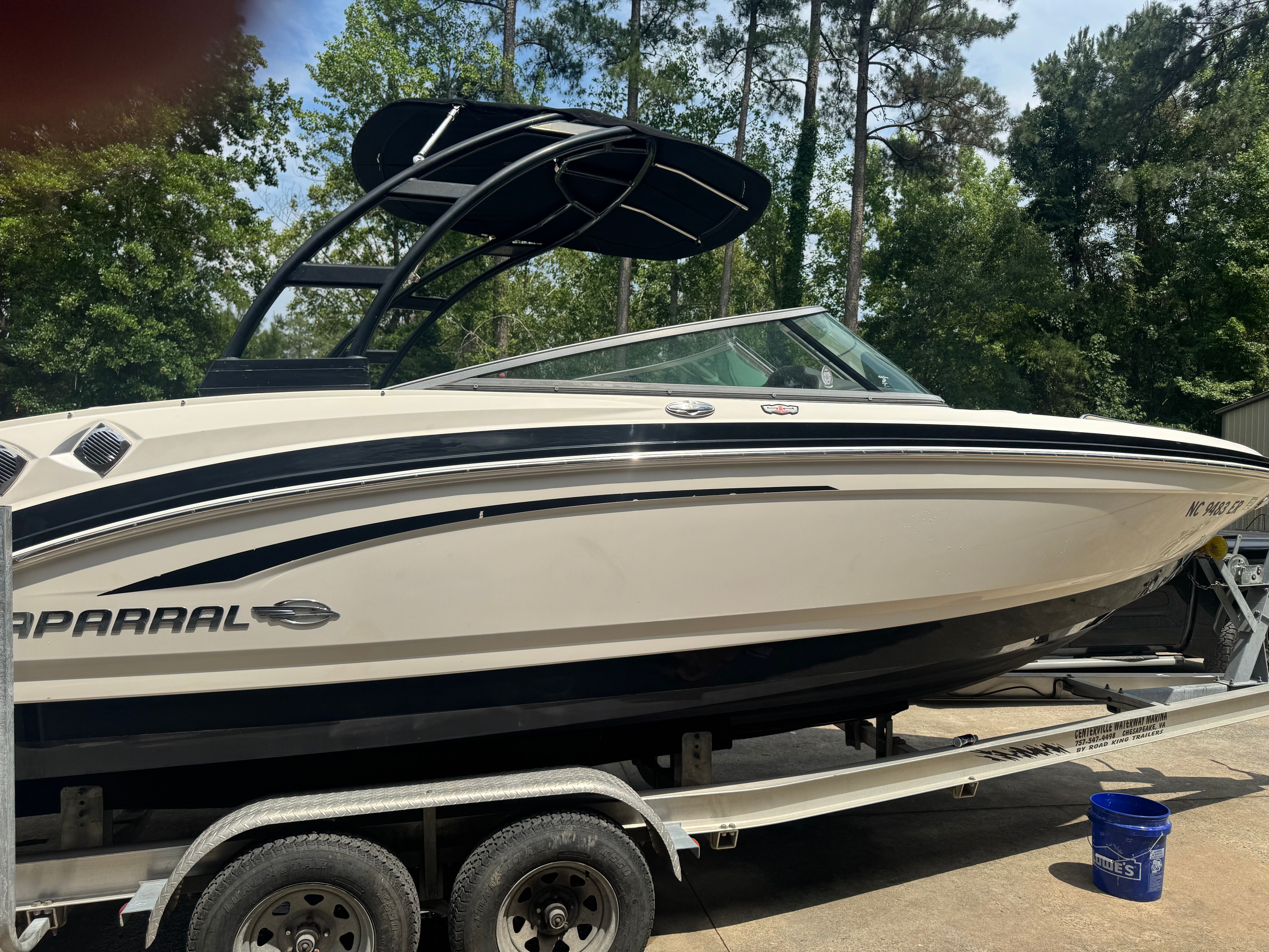 2016 Chaparral 246 SSi boat on trailer outdoors.