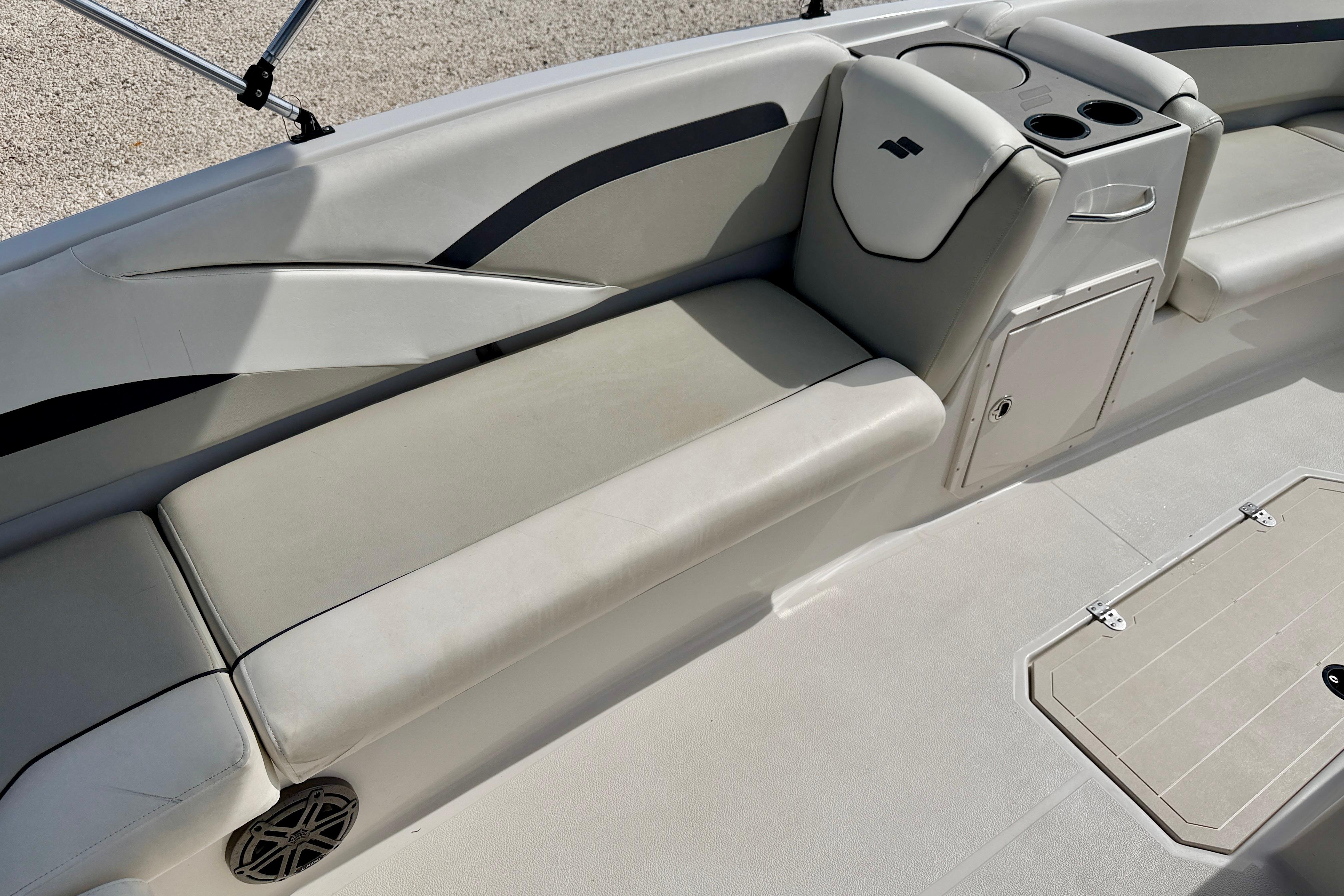 2021 Starcraft SVX 191 OB boat interior with cushioned seating and storage compartments.