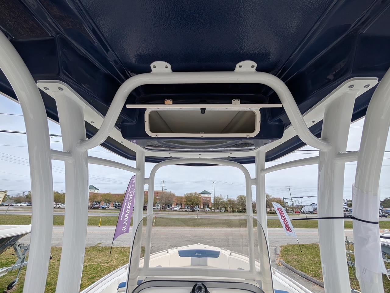 2025 Robalo R222 Explorer boat interior, showcasing sturdy framework and open hatch.