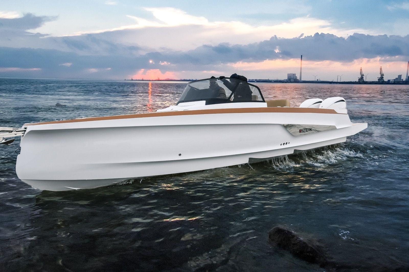 2026 STERK 31 WB Super Sport boat cruising on water at sunset.
