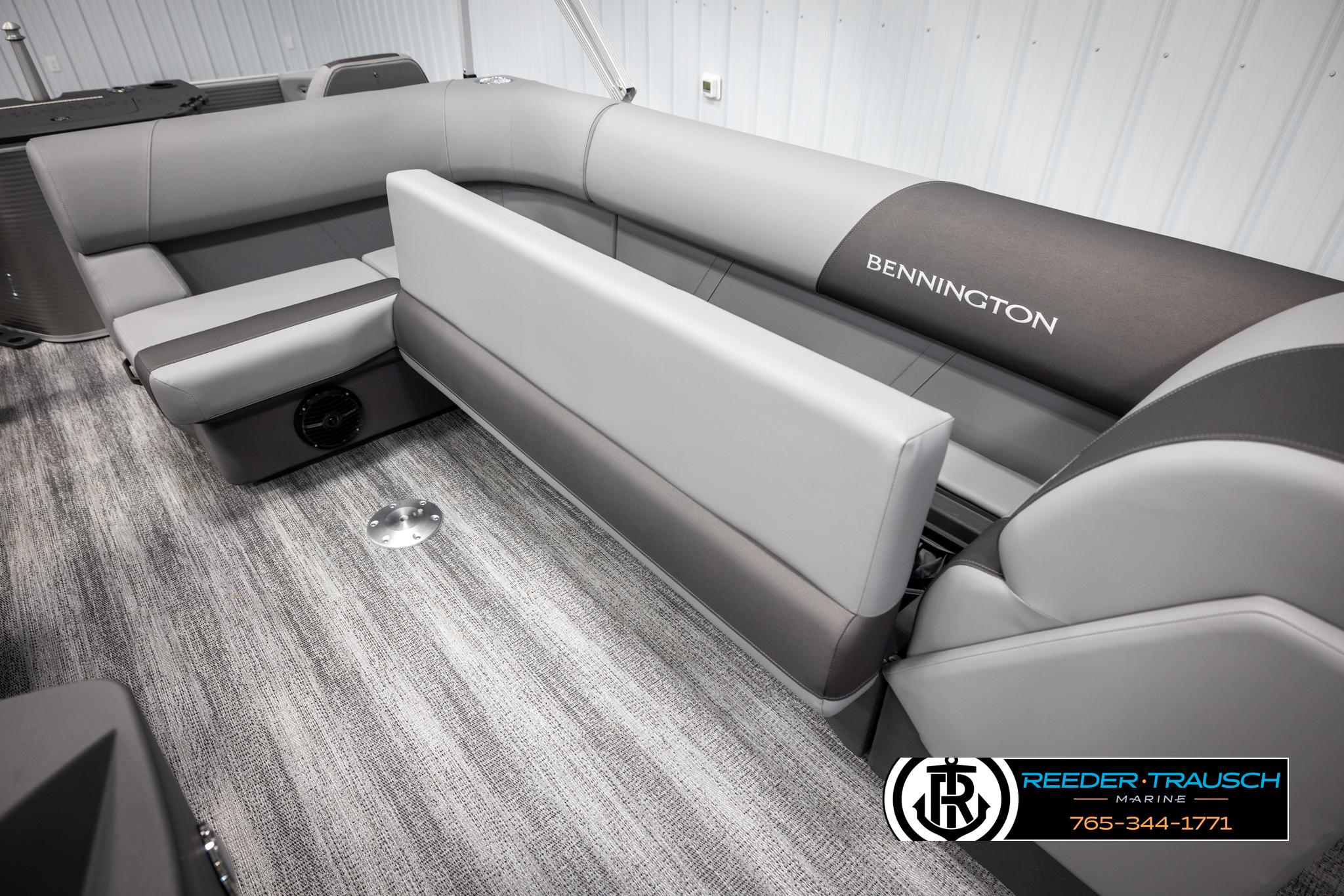 2025 Bennington 21 SFSE boat interior with gray seating and carpet flooring.