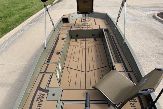 2026 Tracker Grizzly 1756 T Marsh boat interior with seating and deck layout.