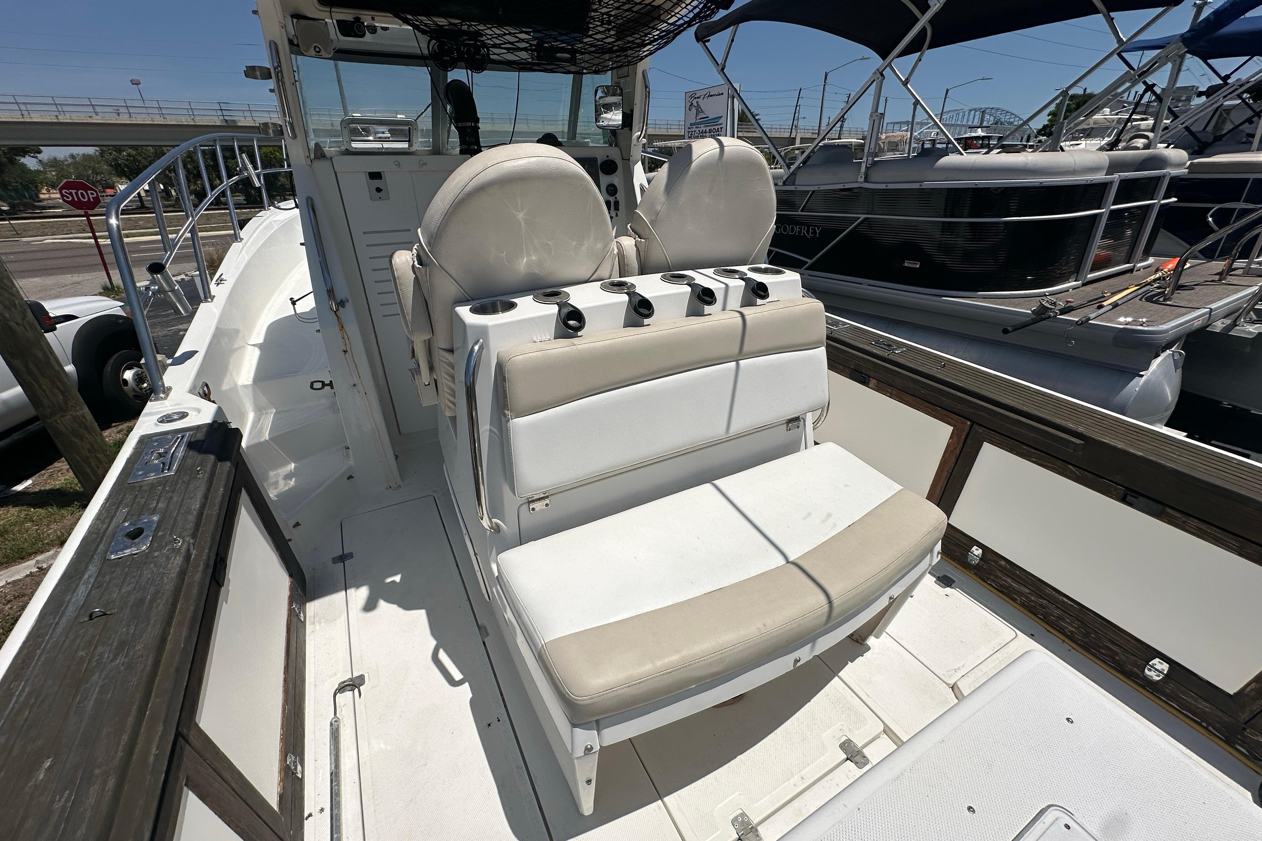 1998 True World Marine TE286 boat interior with seating and control panel.