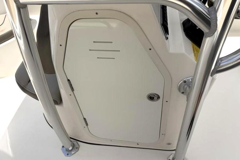 2023 Key West 203 FS boat console door with stainless steel railing.