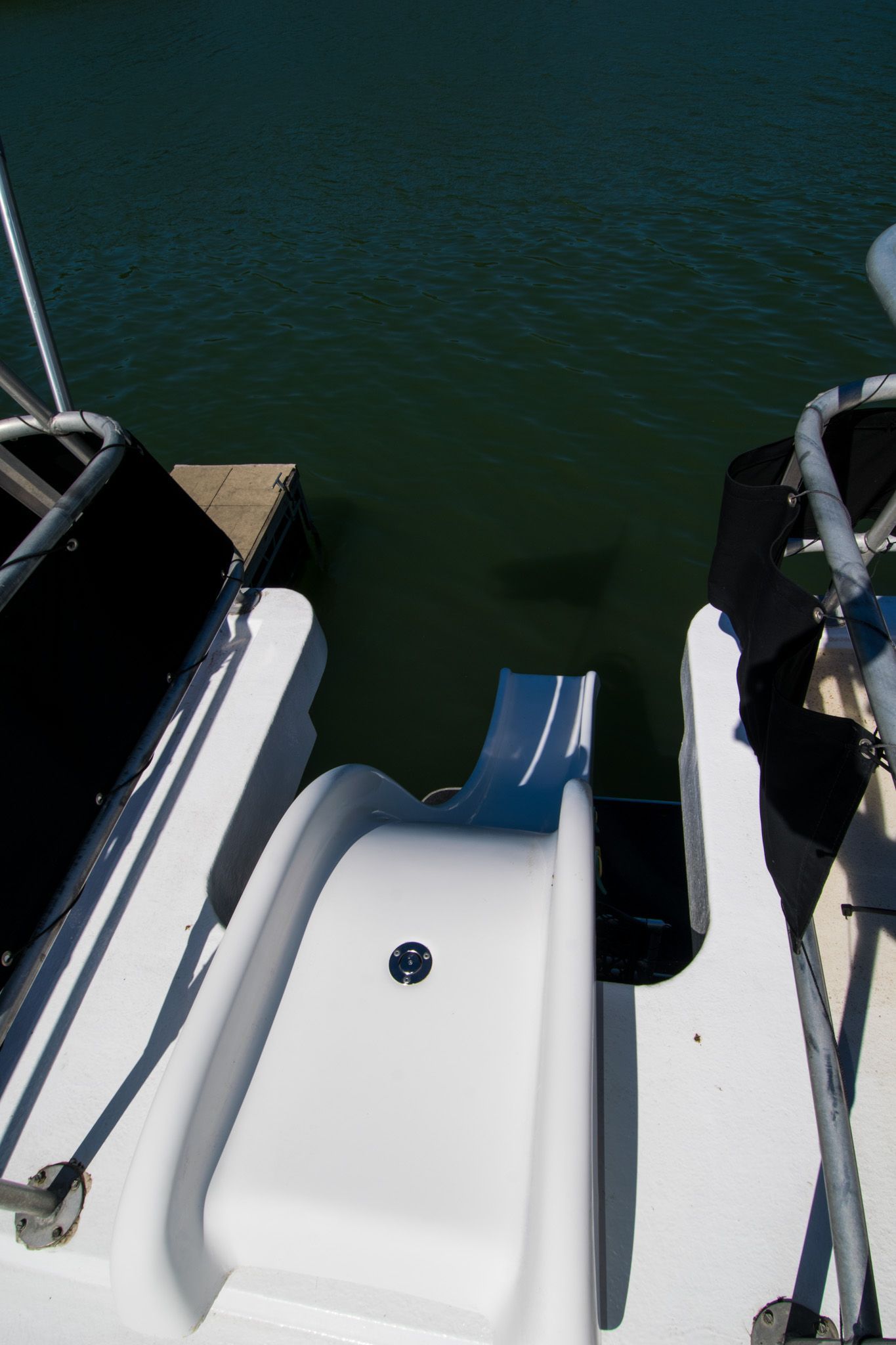 Lakeview 16x70 houseboat with water slide, built in 2003.