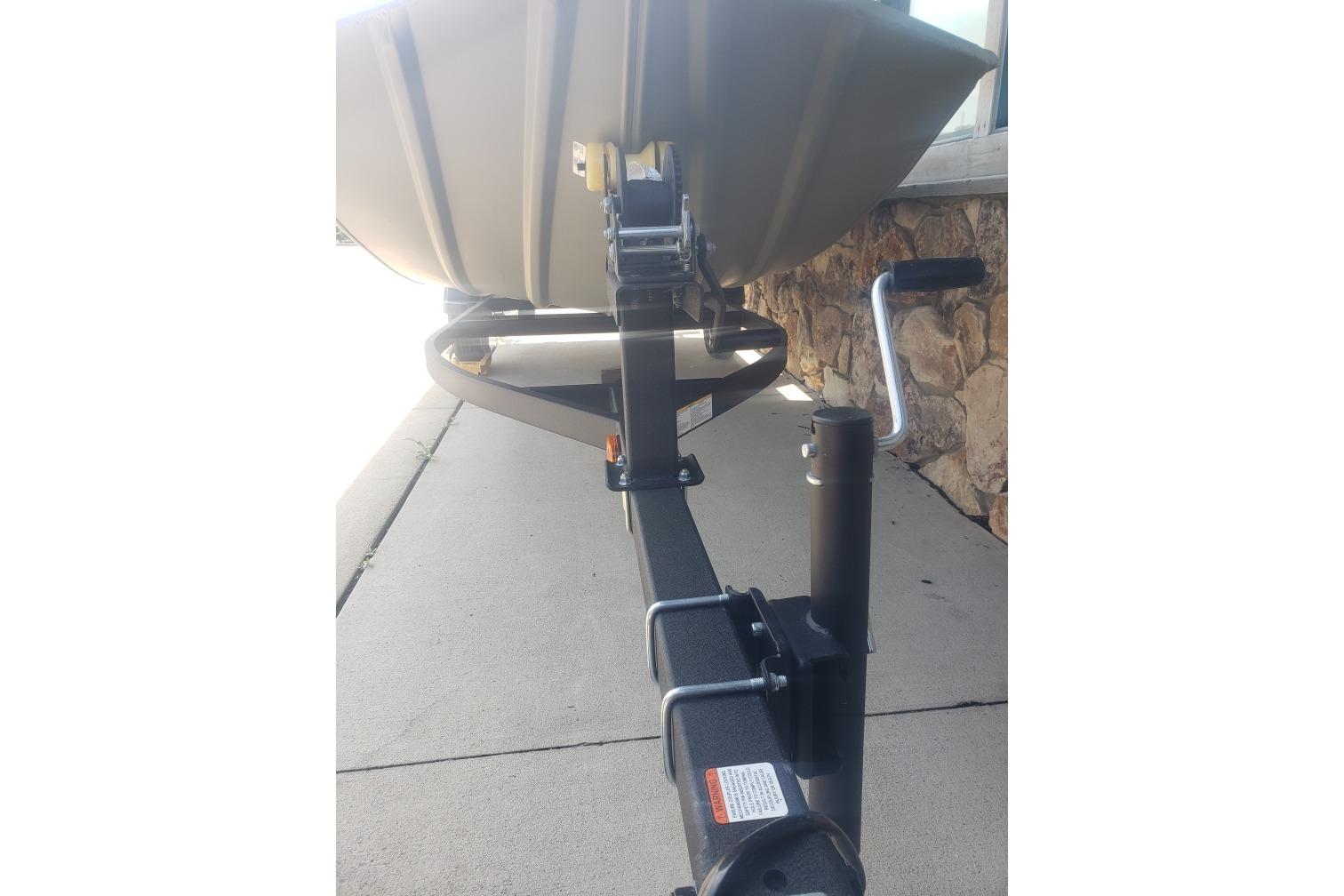 2026 Tracker Grizzly 1754 Utility boat trailer hitch and winch detail.
