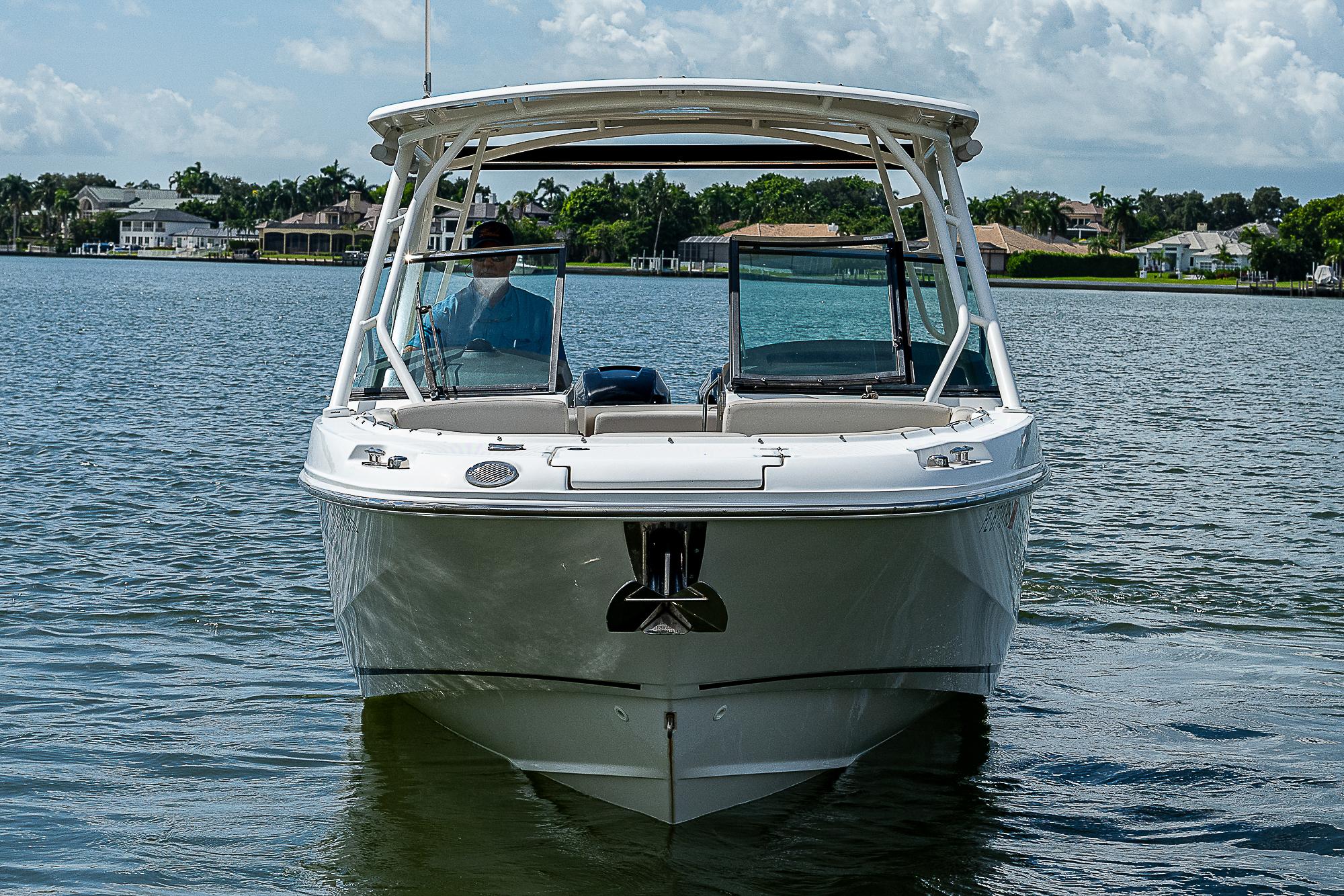 2018 Boston Whaler 270 Vantage boat on calm water, front view.