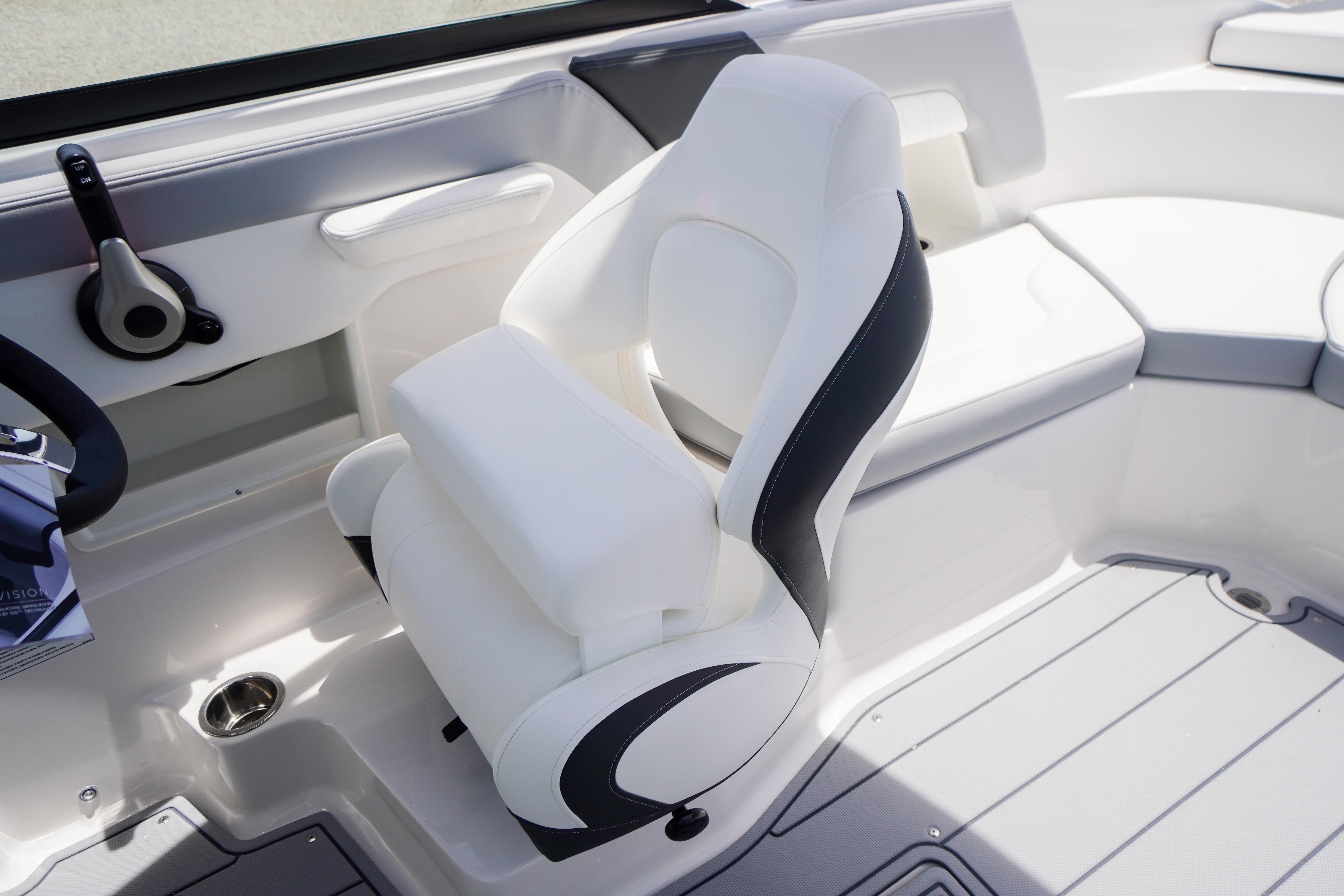 2026 Chaparral 23 SSi OB boat interior with white seating and modern design.