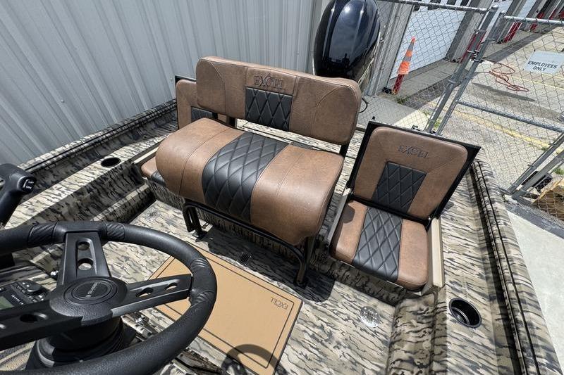 2027 Excel 230 Bay Pro Elite boat interior with brown and black seating.