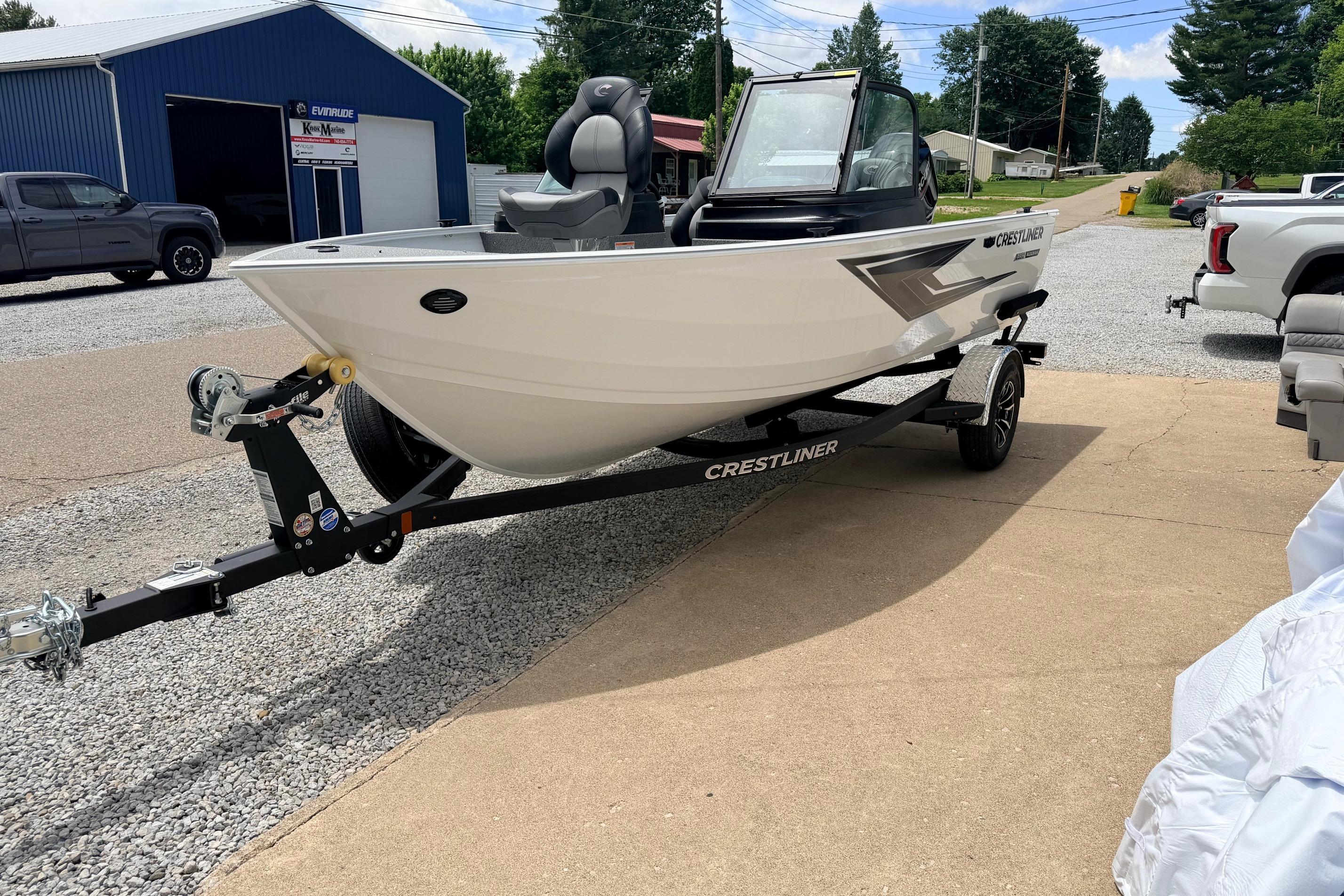 2026 Crestliner 1650 Kodiak WT on trailer, parked outdoors.
