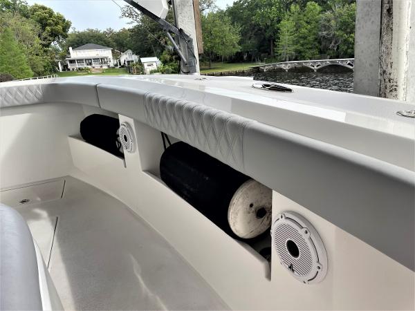 2020 Front Runner 39 Center Console boat interior with speakers and storage compartments.