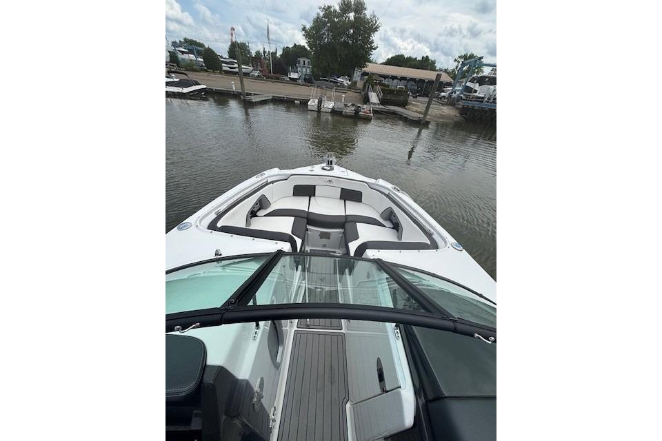 2023 Monterey M-45 boat docked at a marina, featuring spacious seating and sleek design.