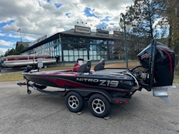 2025 Nitro Z19 boat parked in front of a building.