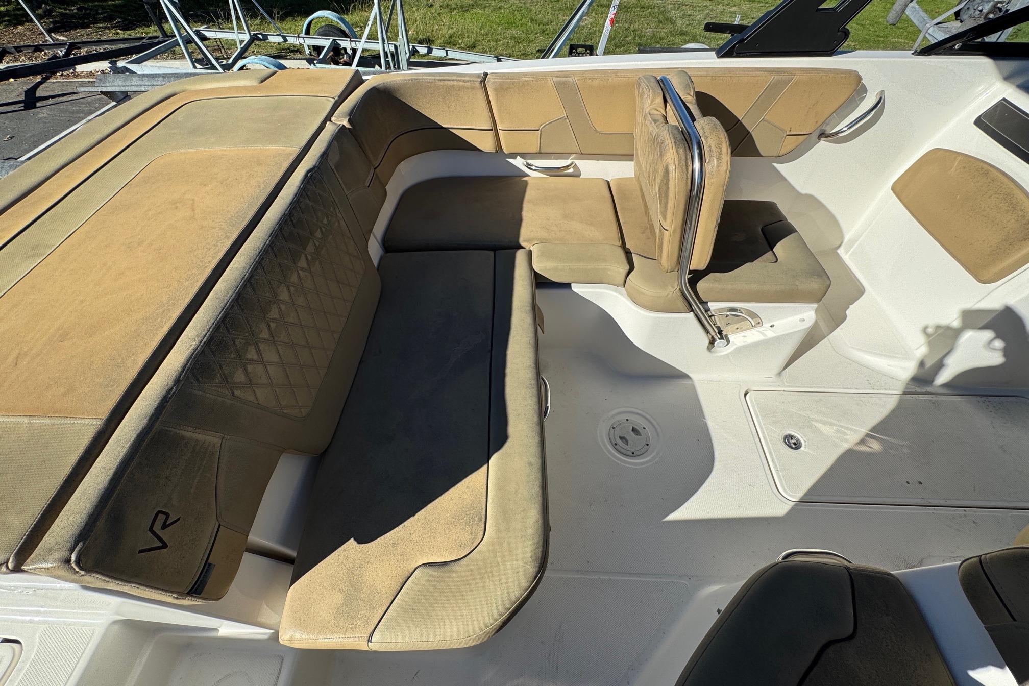 2022 Bayliner VR6 Bowrider OB interior with tan seating and spacious layout.