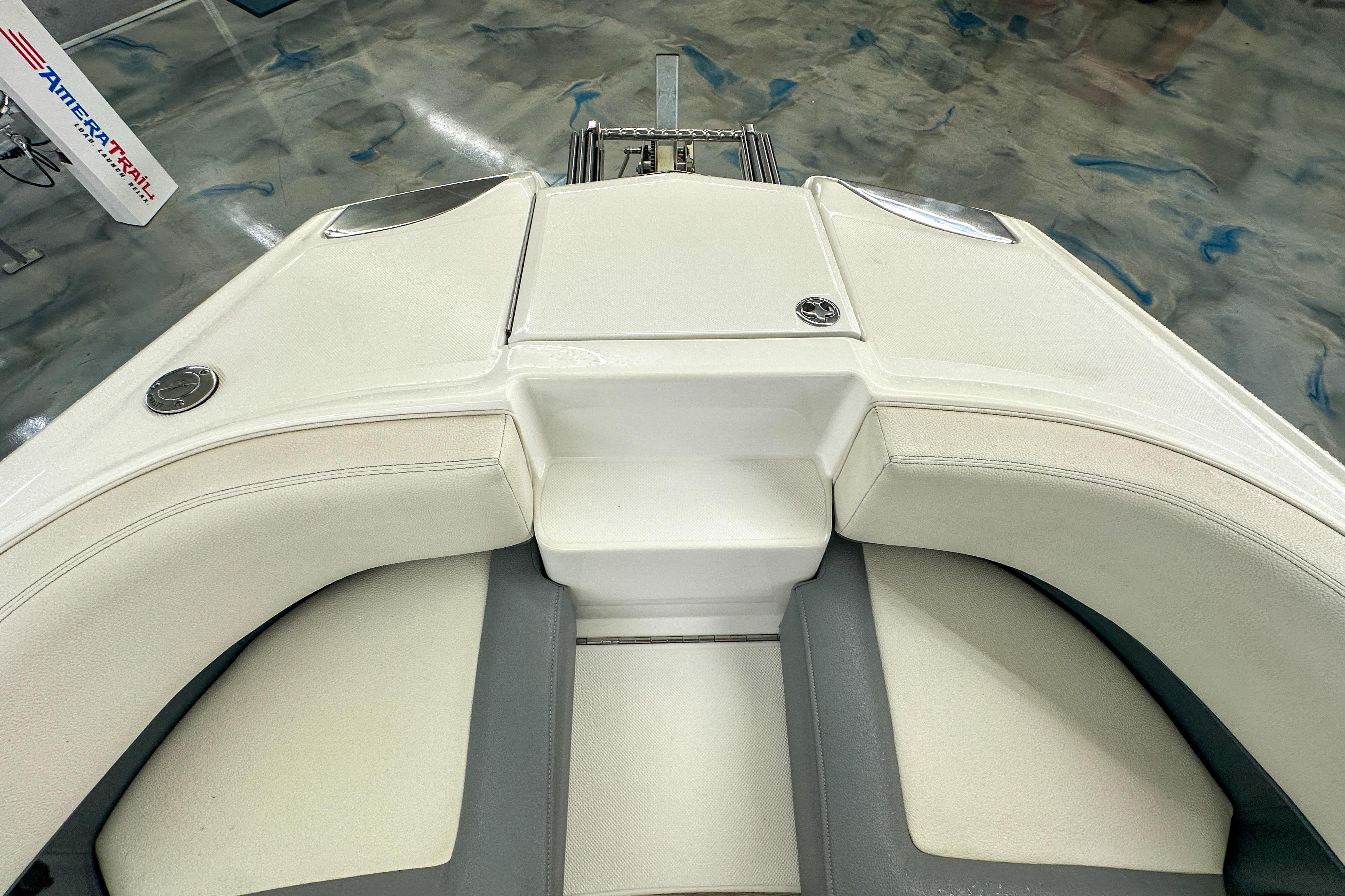 2022 Cobalt 25SC boat interior with white seating and sleek design.