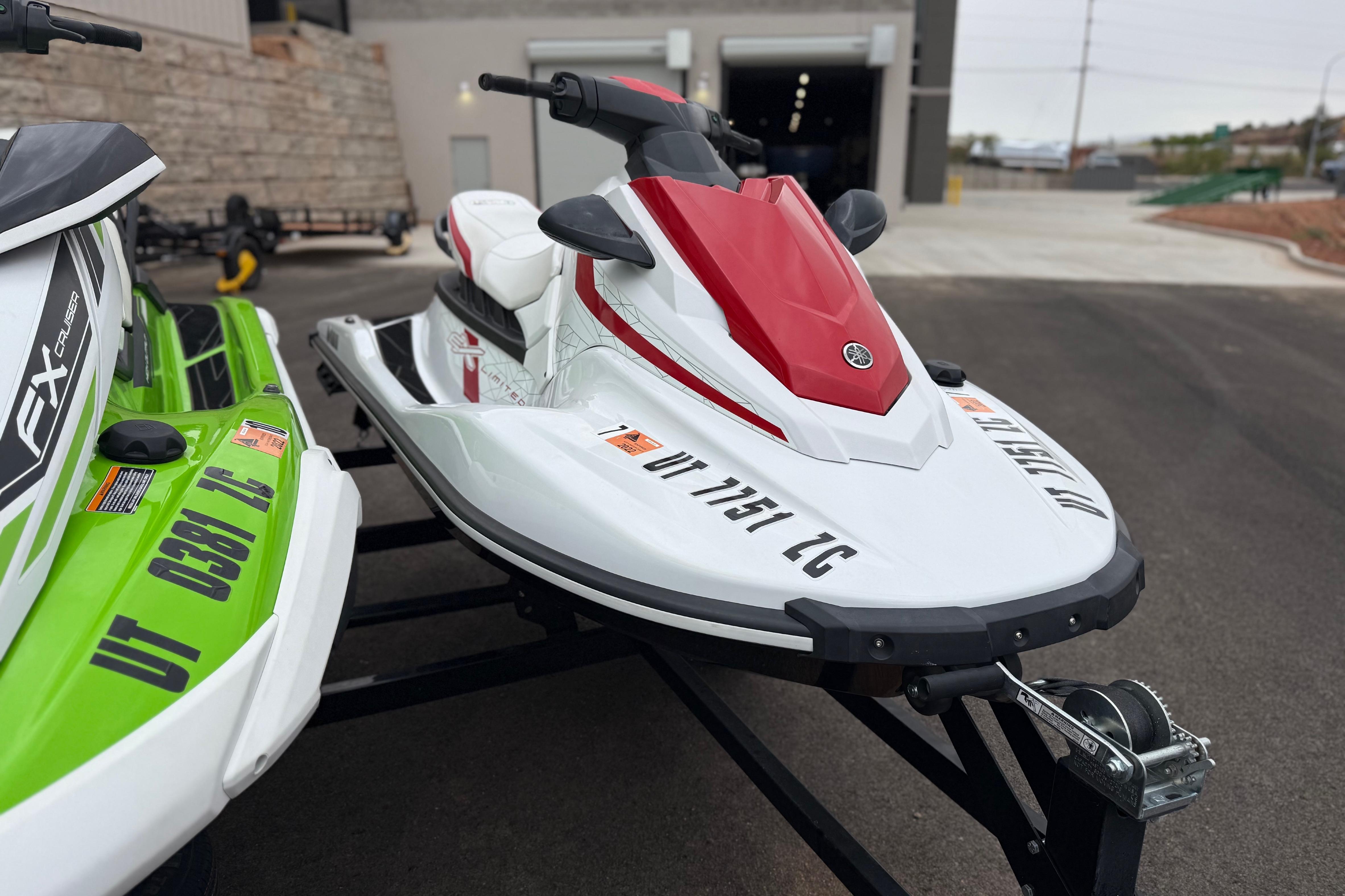 2021 Yamaha WaveRunner EX Limited jet ski with red and white design on a trailer.