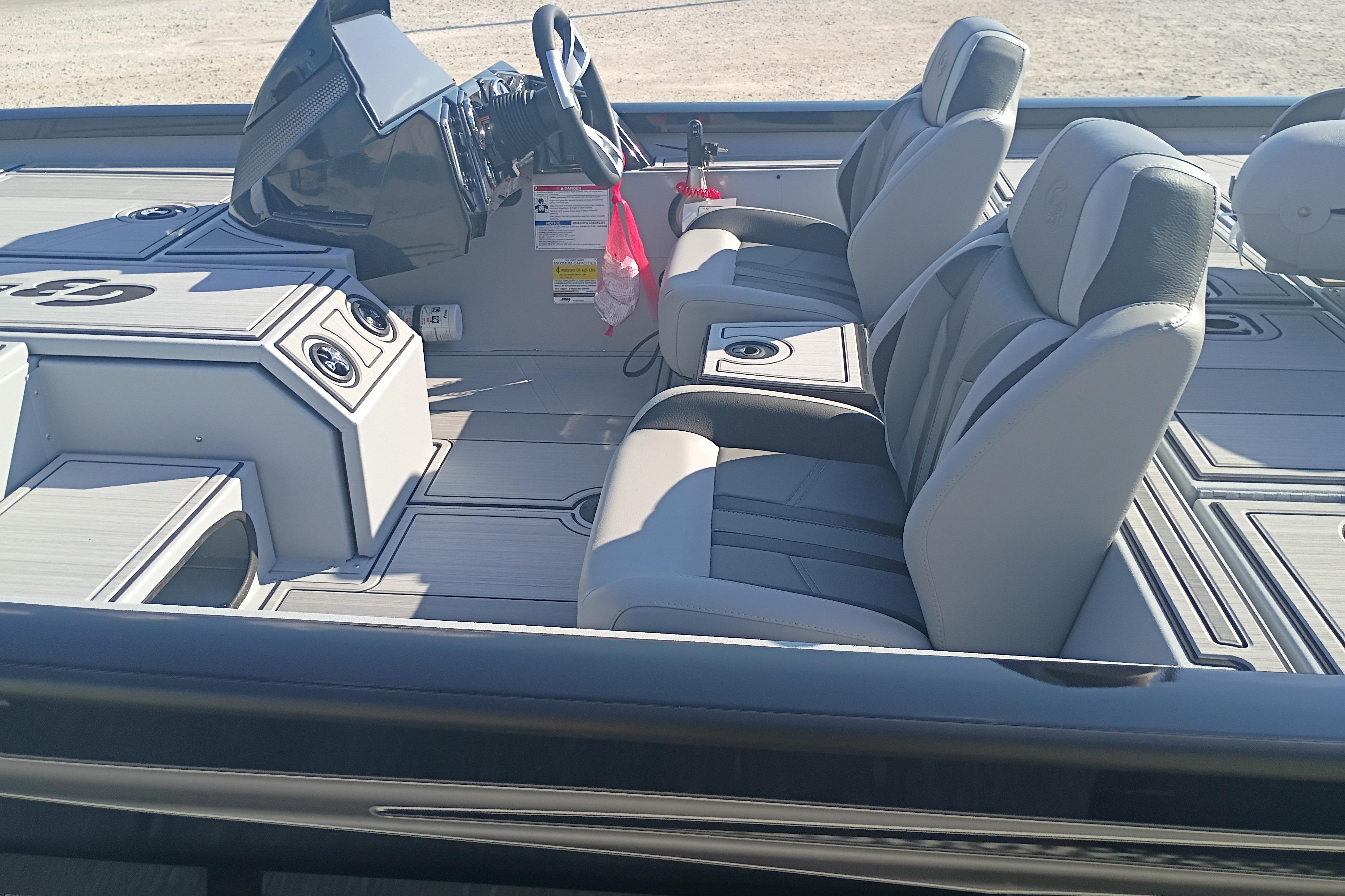 2026 G3 1810SE boat interior with modern seating and steering console.