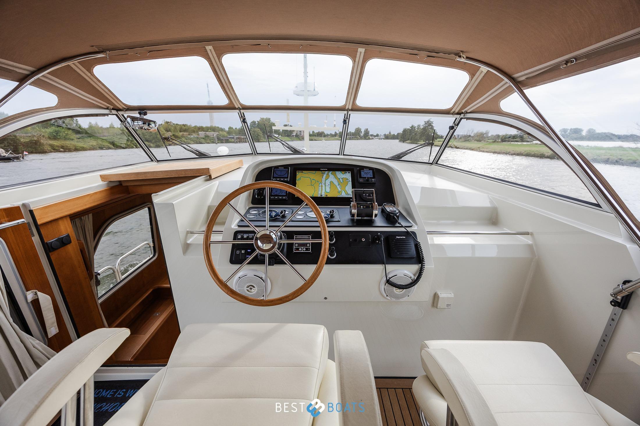 Helm of 2010 Linssen Grand Sturdy 470 AC Mark II Twin yacht, featuring navigation equipment.