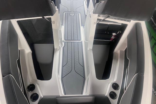 Interior view of 2025 Cobalt CS23 Surf boat, featuring sleek seating and modern design.