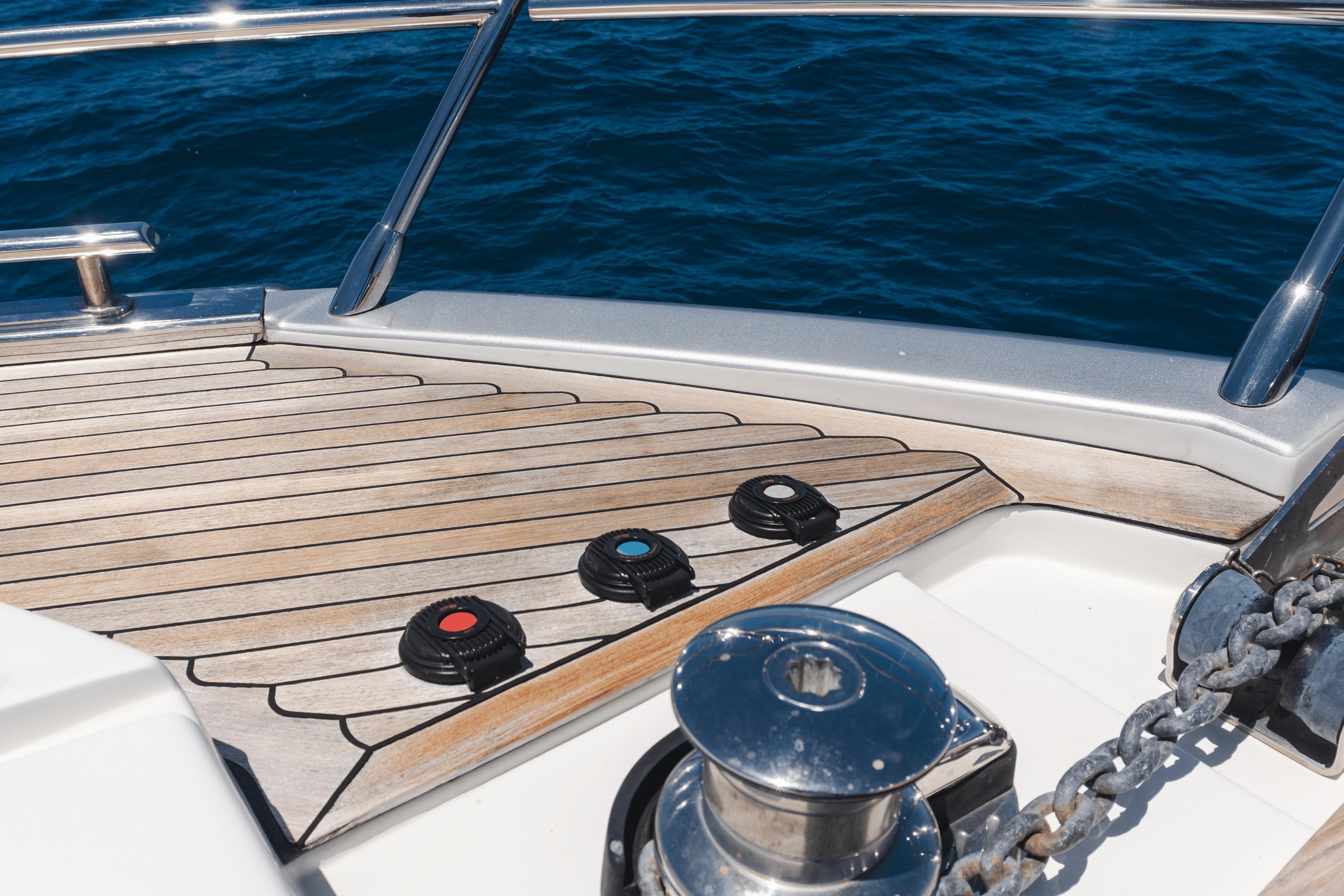 Deck of 2020 Azimut 60 yacht with winch and ocean view.