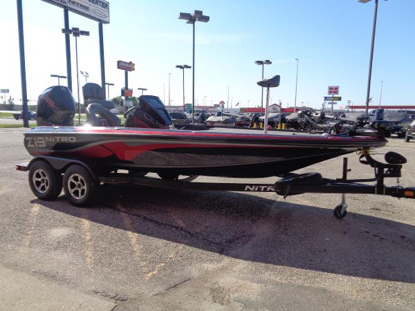 2024 Nitro Z19 Pro boat on a trailer in a dealership lot.