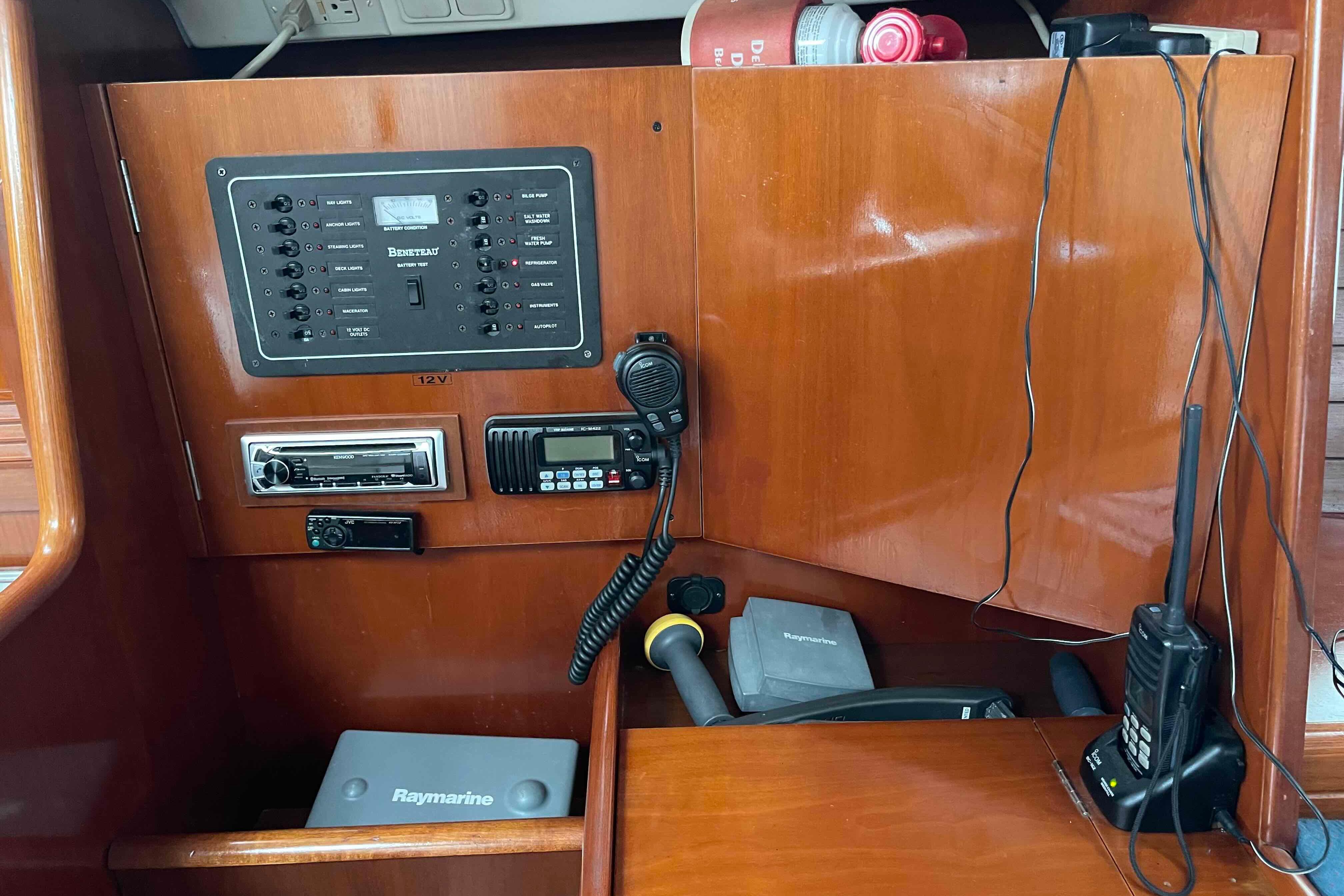 Control panel and equipment inside a 2003 Beneteau 361 sailboat cabin.