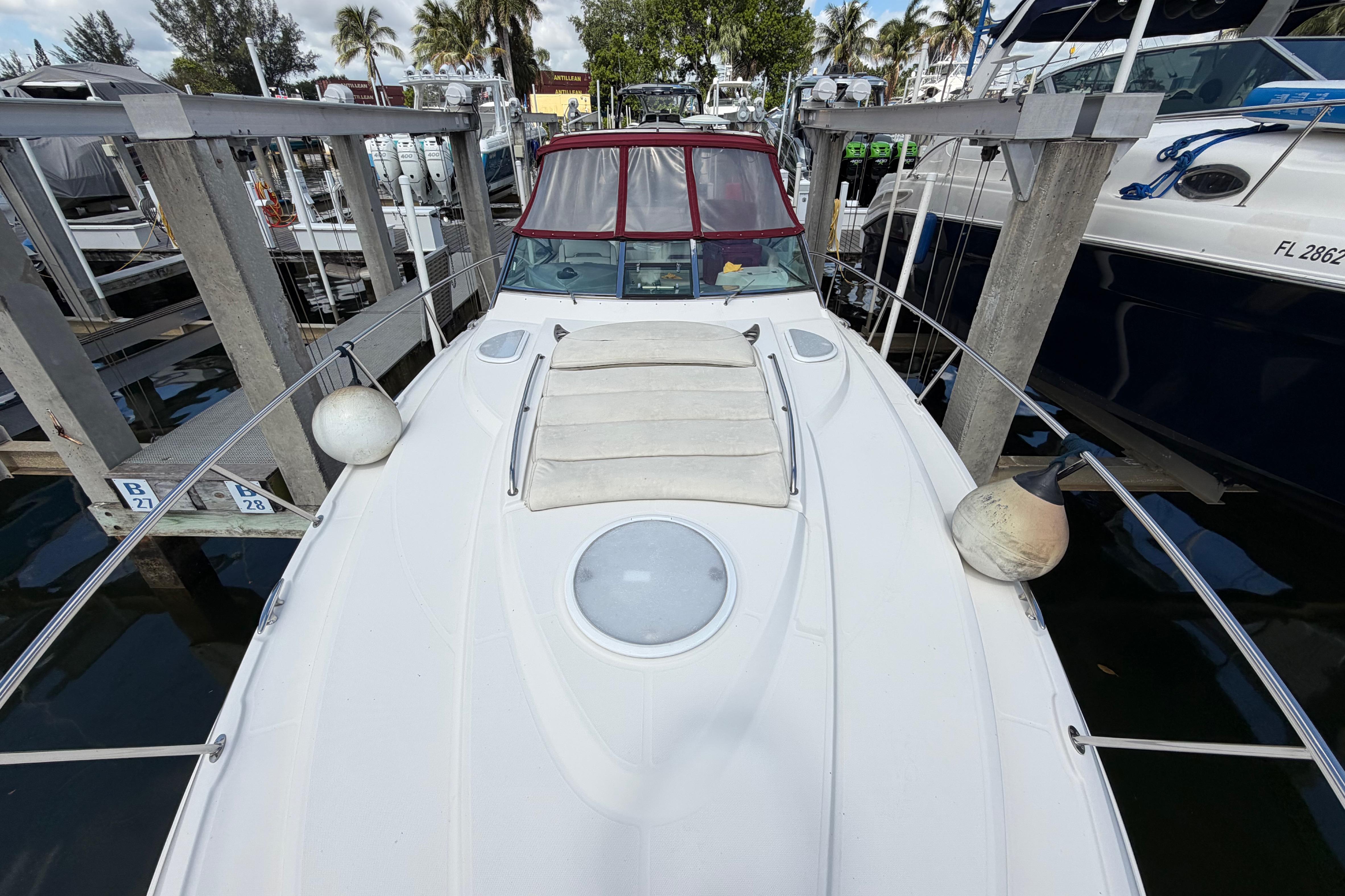 2007 Monterey 350 Sport Yacht docked, featuring sleek design and spacious deck.