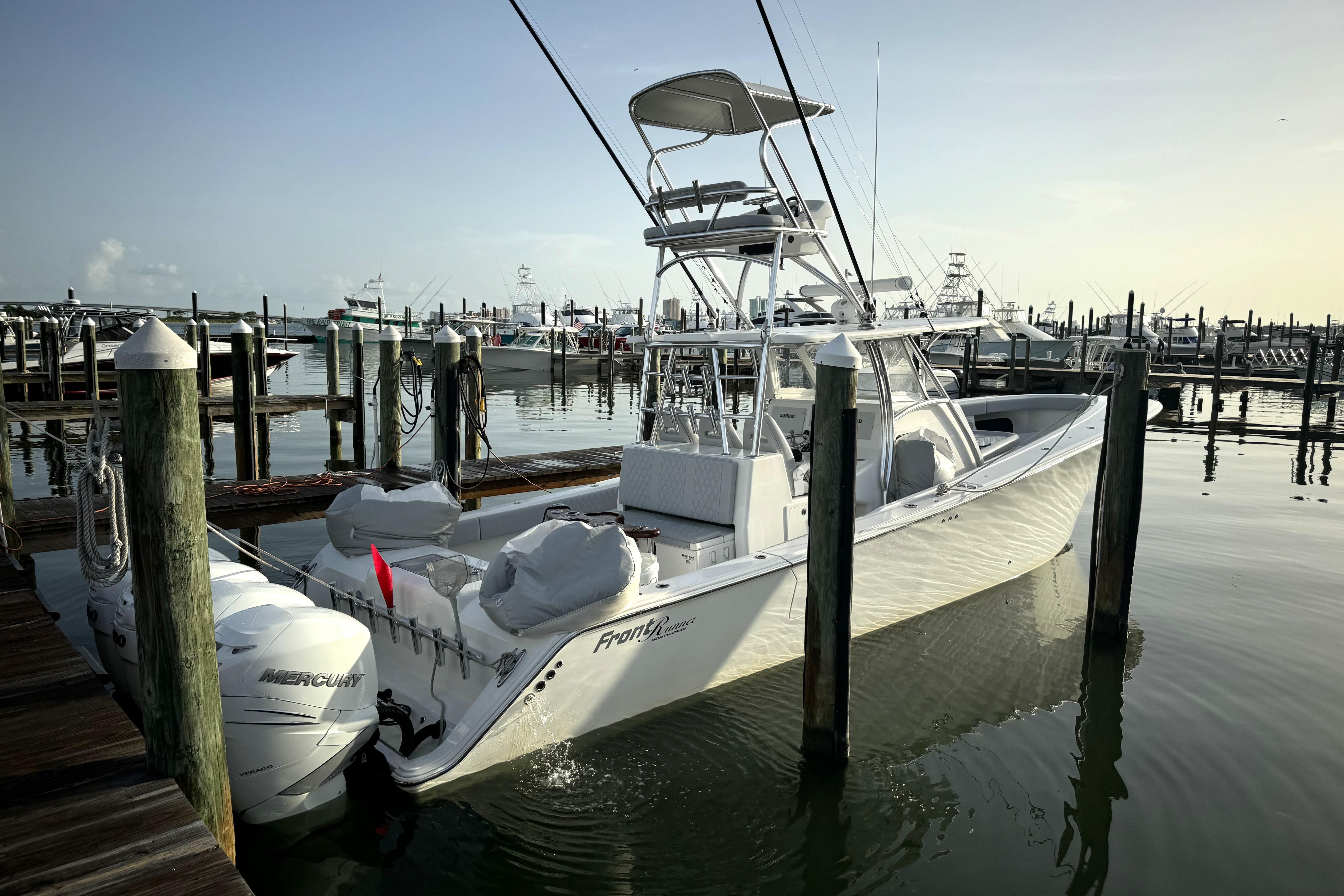 2020 Front Runner 39 Center Console boat docked at marina with twin Mercury engines.
