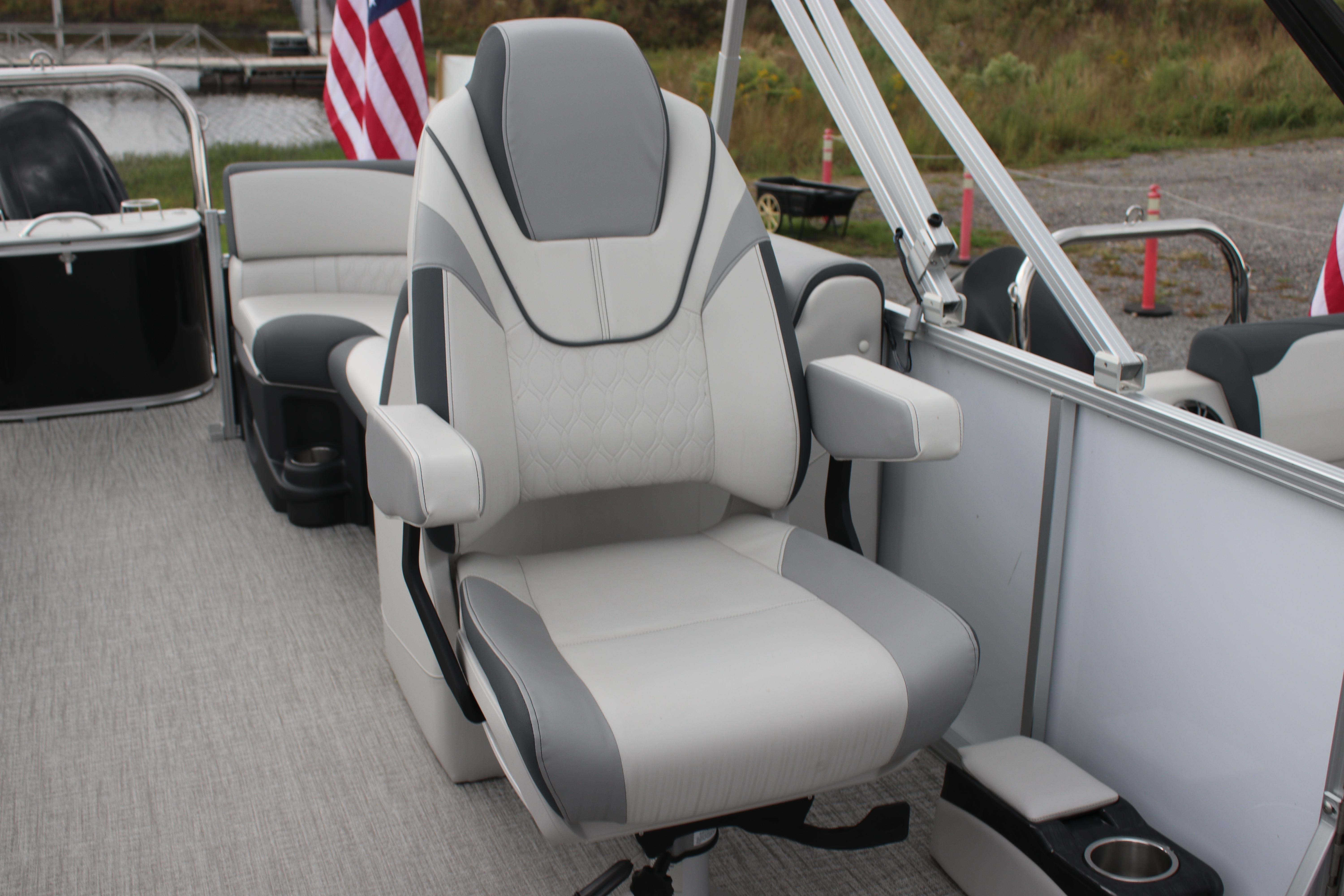 2025 Avalon LSZ Quad Lounger boat seat with armrests, featuring modern design and comfort.