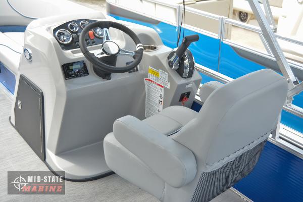 2024 Lowe Ultra 200 Cruise boat helm with steering wheel and captain's chair.