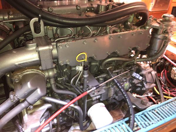 Engine of a 2001 Jeanneau 45.2 sailboat, showcasing mechanical components and wiring.
