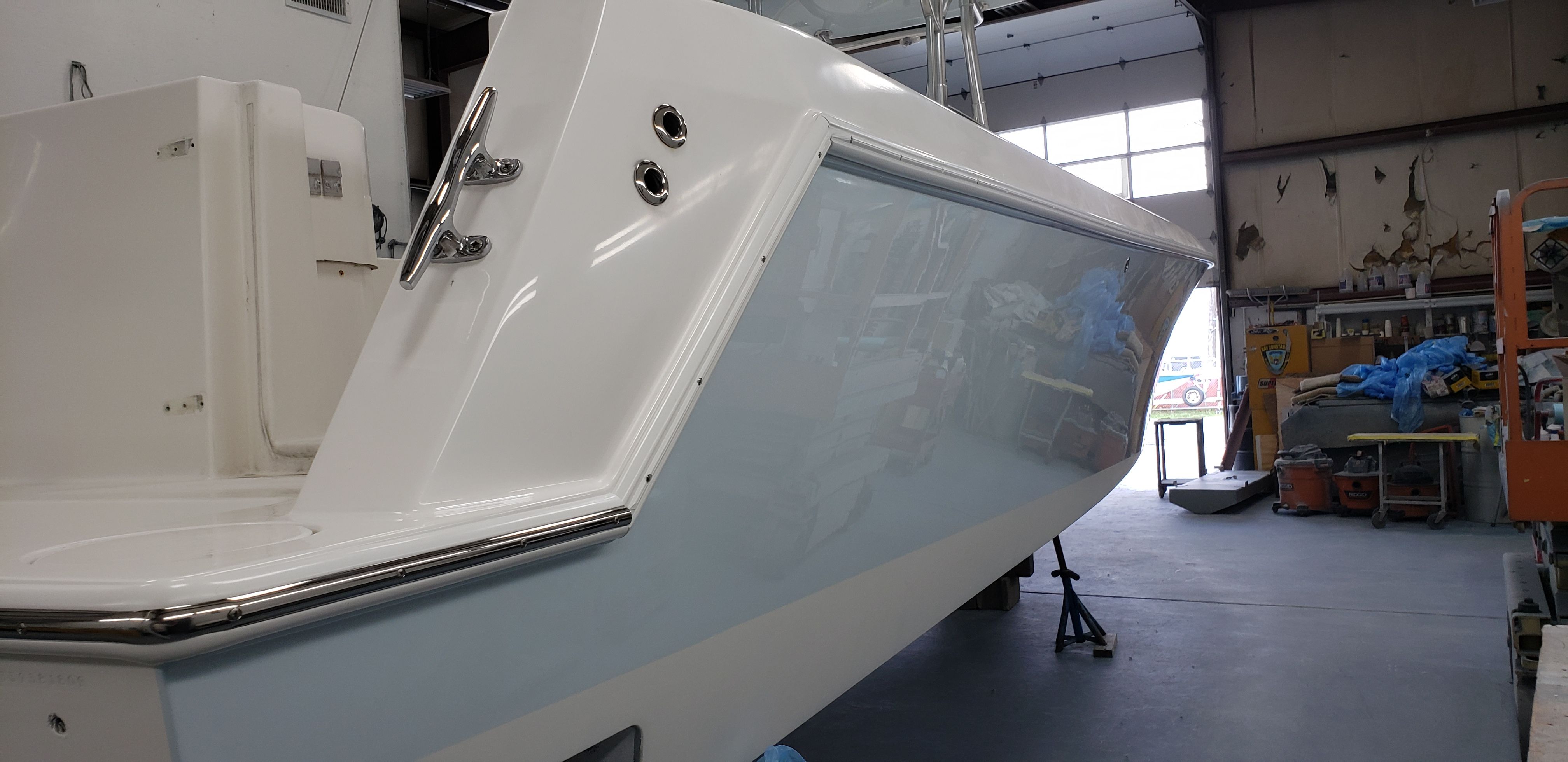 2009 Contender 33 Tournament boat in a workshop.