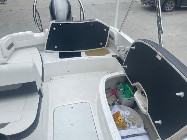 2022 Hurricane SS185 OB boat interior with open storage compartments.