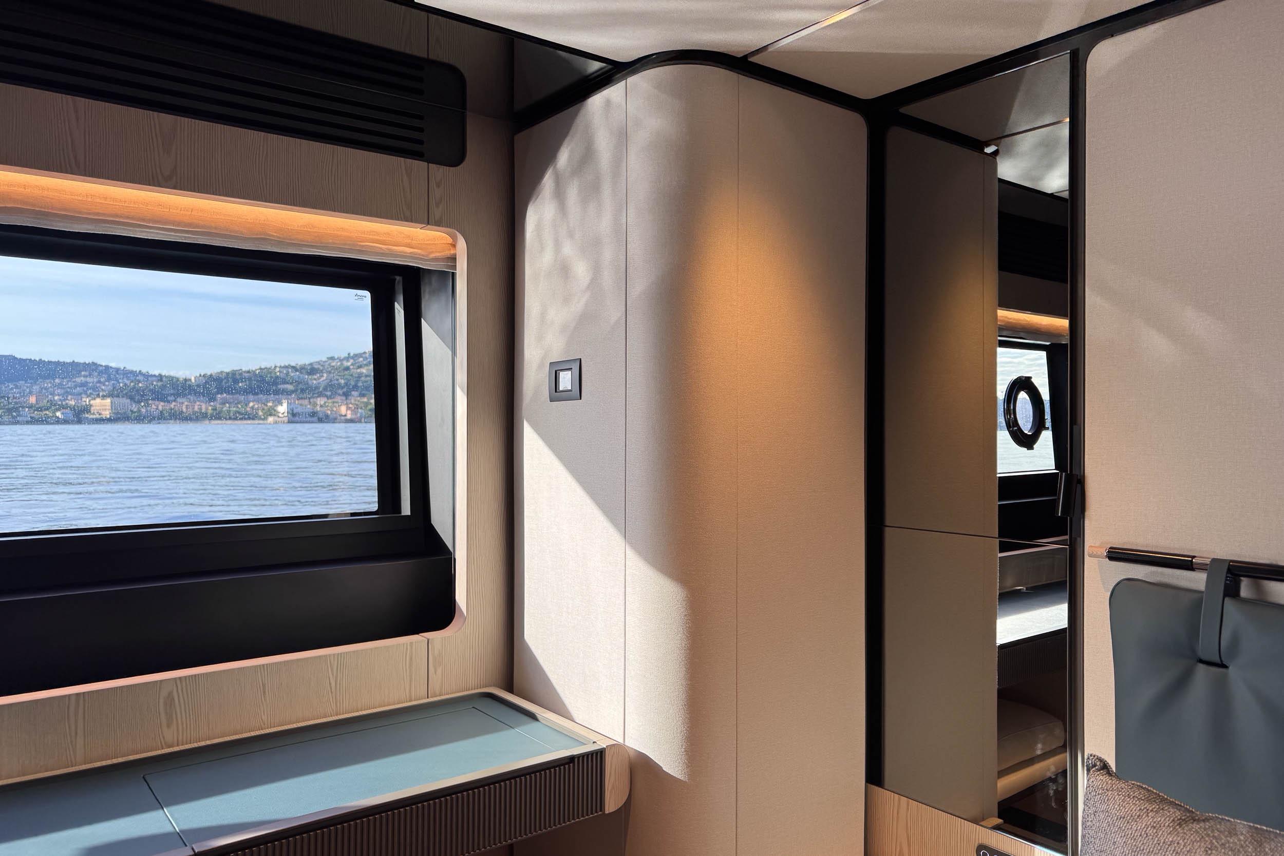 Luxurious interior of 2025 Ferretti Yachts Infynito 80 with scenic ocean view.