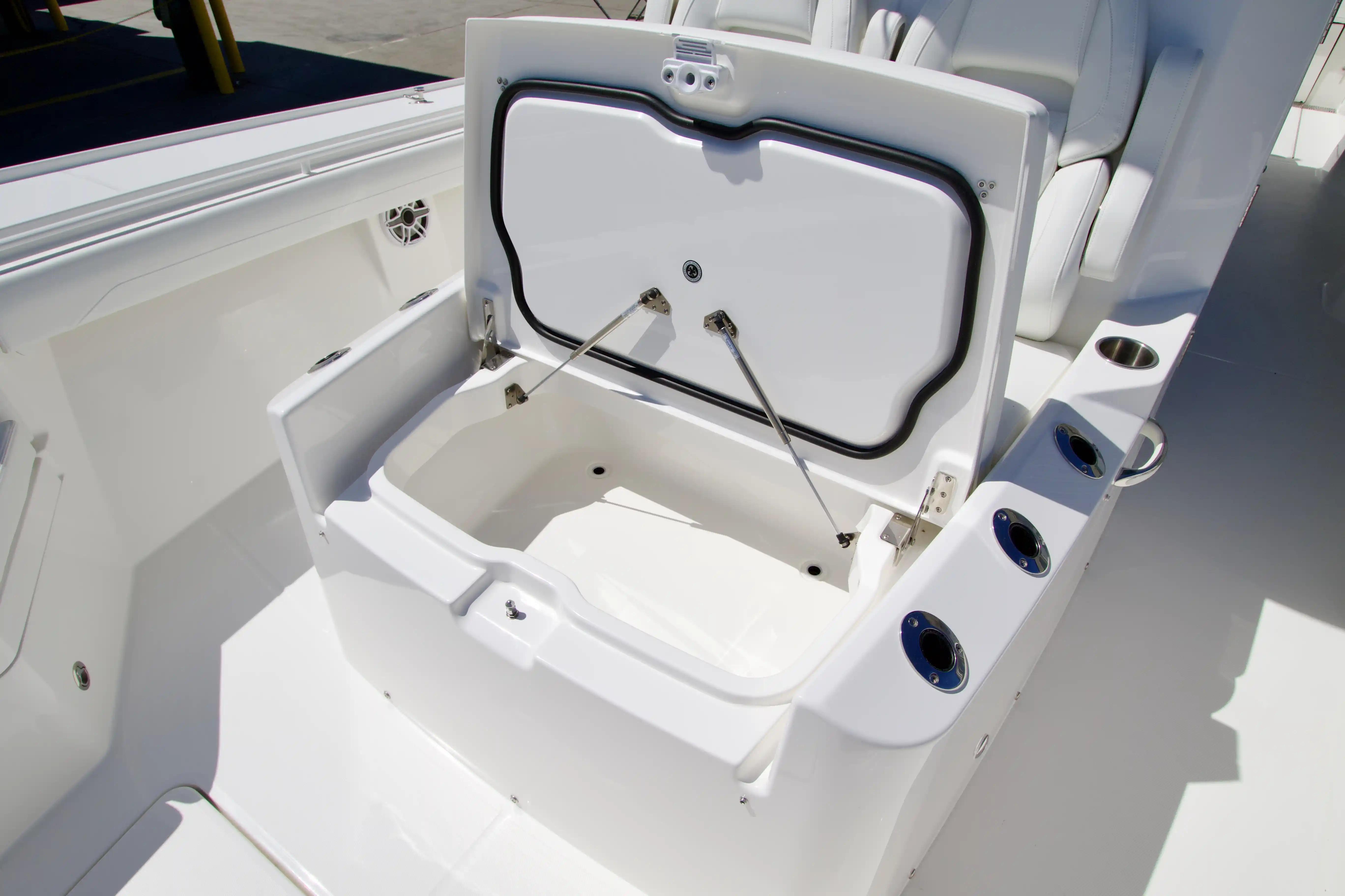 Open storage compartment on a 2027 Regulator 35 boat, showcasing interior space and design.