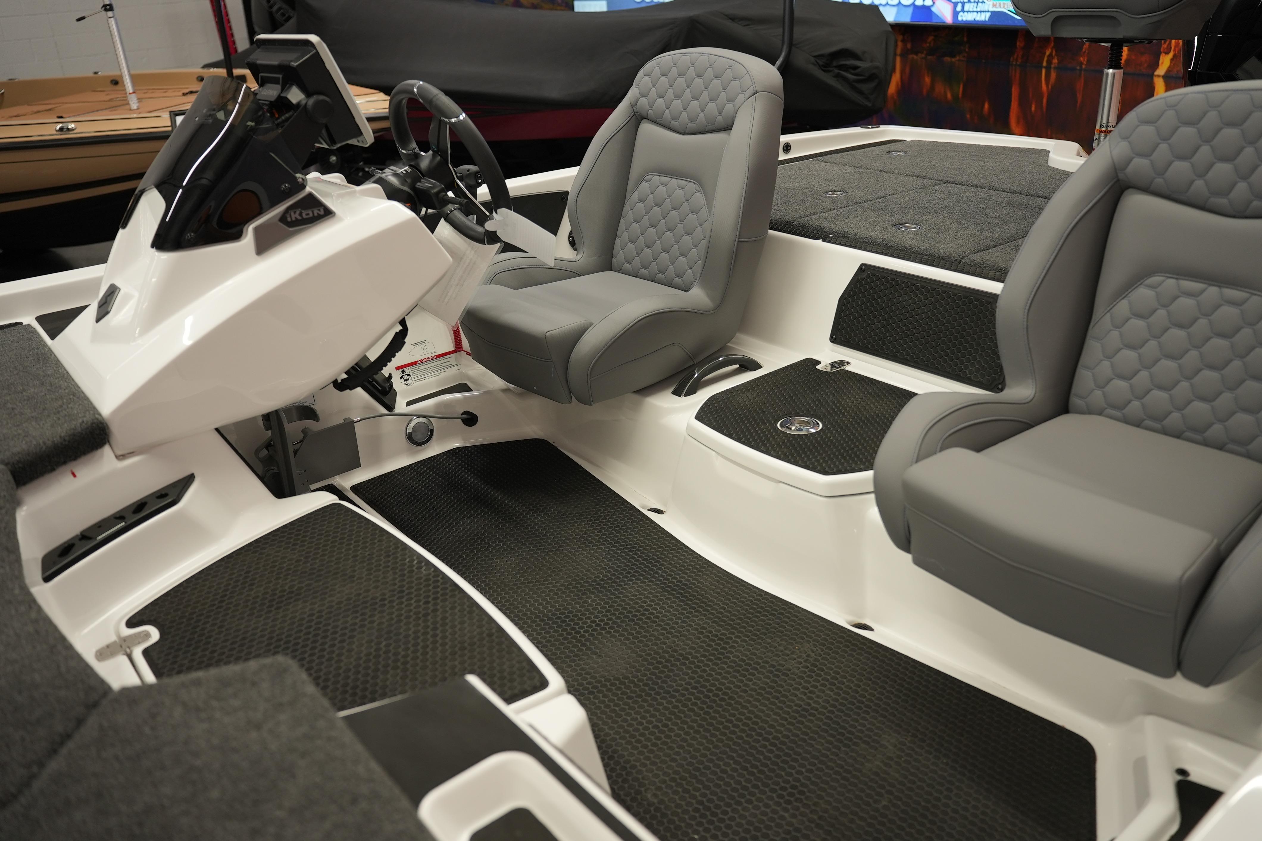 Interior of 2026 iKon VLE21 boat with gray seats and modern dashboard.
