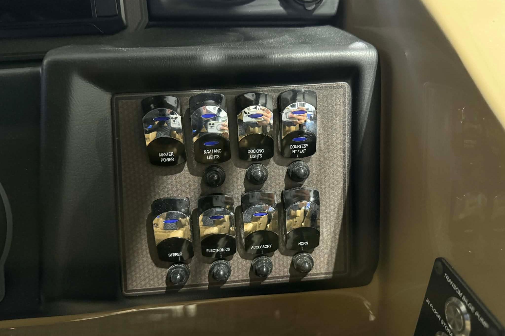 Control panel of 2026 Manitou Encore VP 230 with labeled switches.