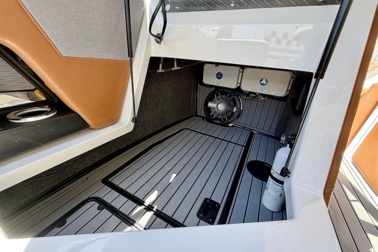 Interior storage compartment of 2021 Nautique Super Air Nautique G23 boat.