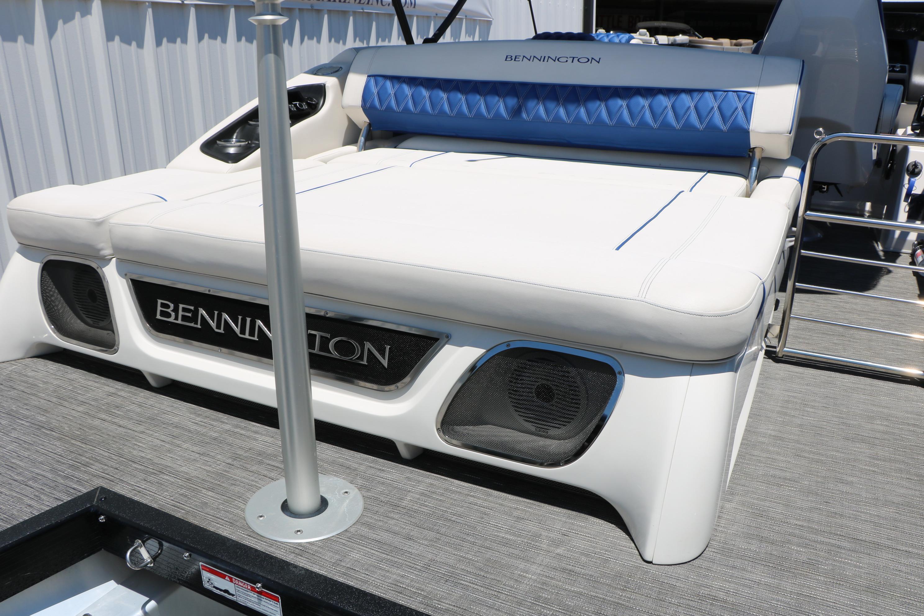 2024 Bennington 23 RX Swingback boat with luxurious seating and sleek design.