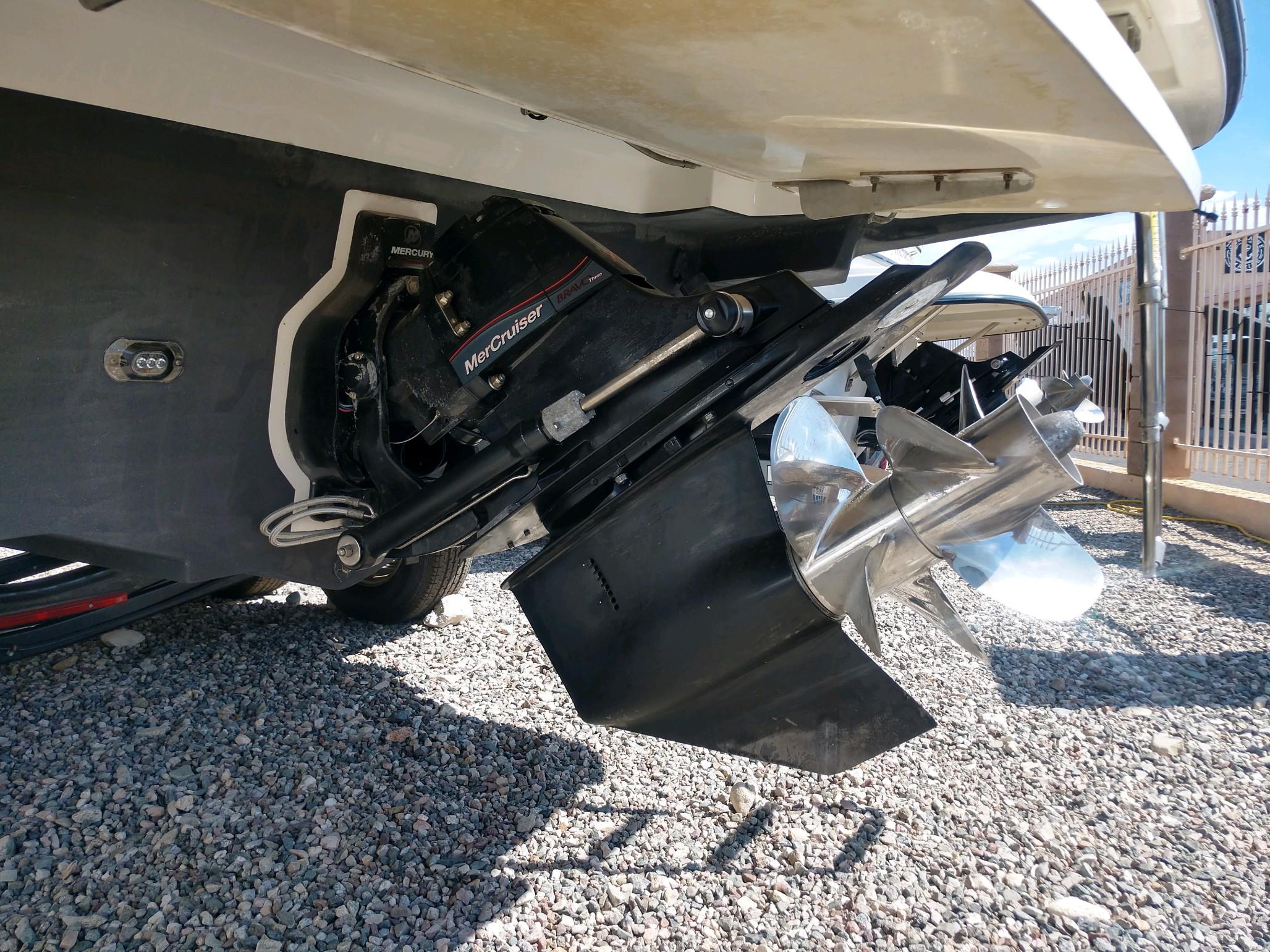 Close-up of 2018 Sea Ray SLX 280 boat's MerCruiser engine and propeller.