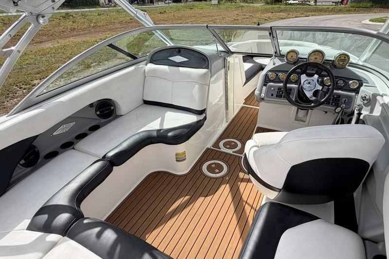 2004 MasterCraft XStar boat interior with sleek seating and modern dashboard design.