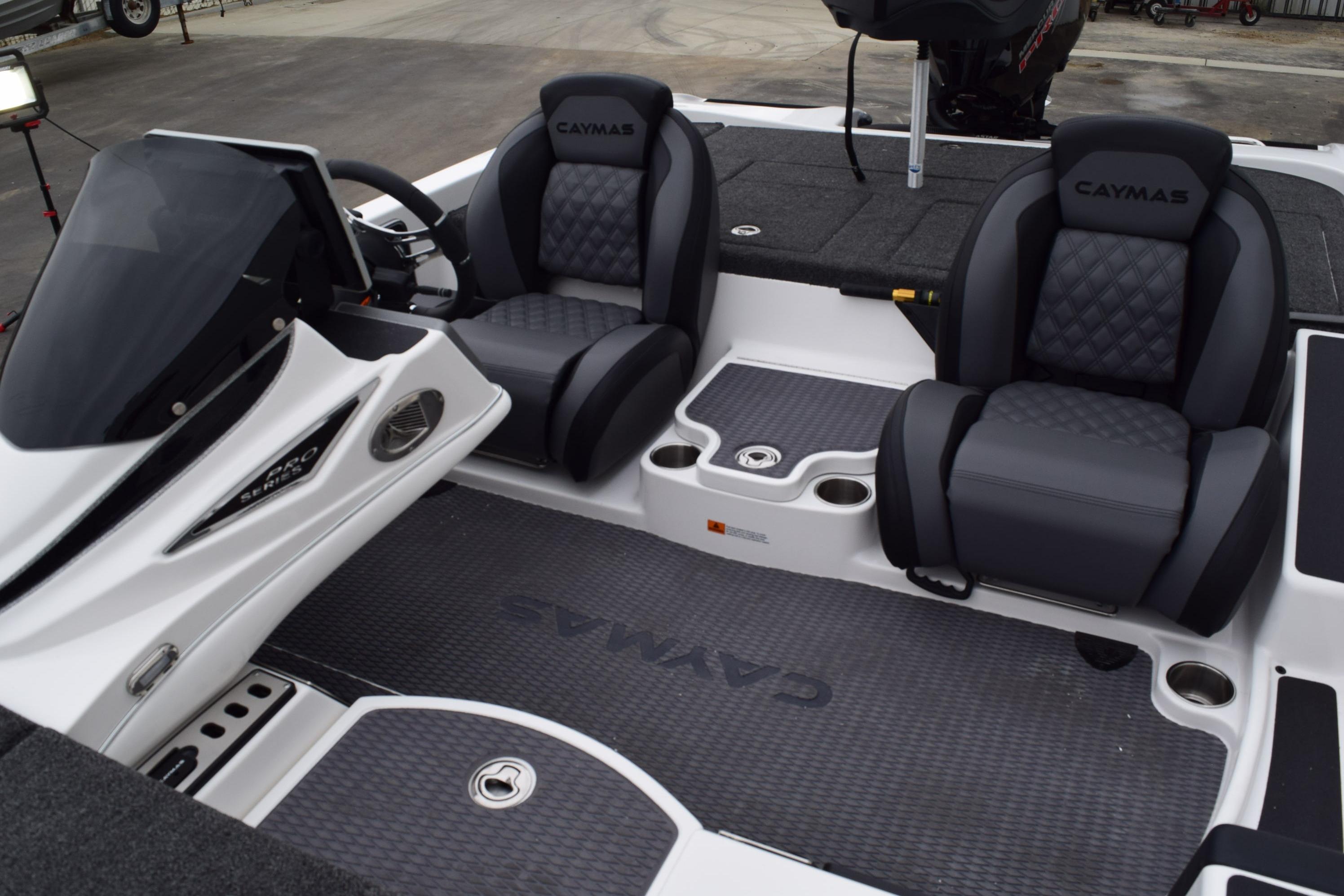 2027 Cayams CX 20 Pro boat interior with dual seats and steering console.