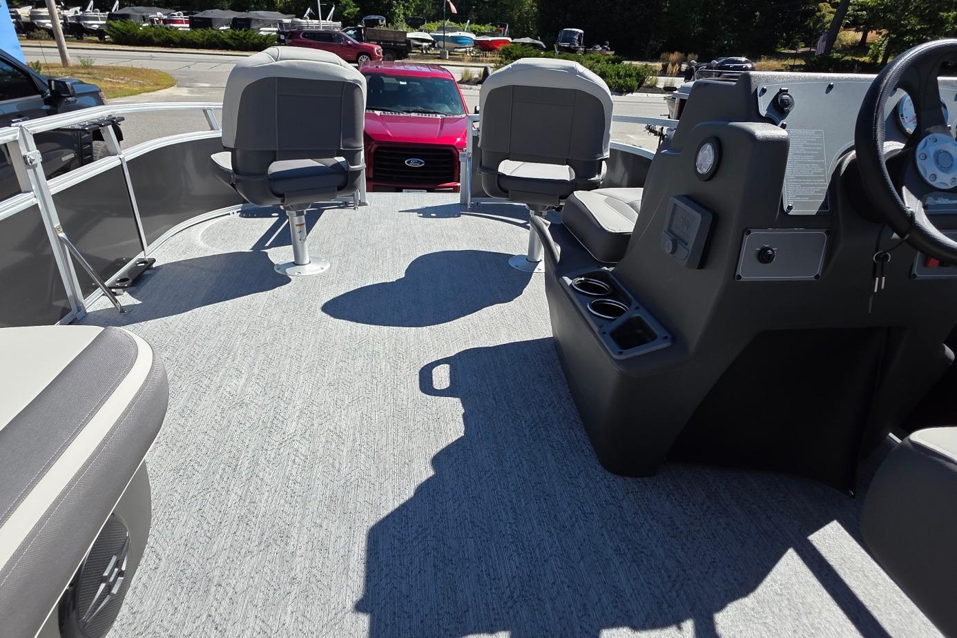 2026 Sun Tracker BB 16 XLS boat interior with seating and steering console.