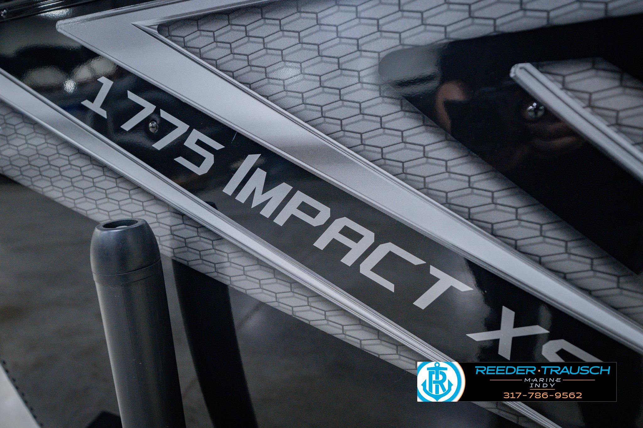 2026 Lund 1775 Impact XS boat with hexagonal pattern and Reeder-Trausch Marine logo.