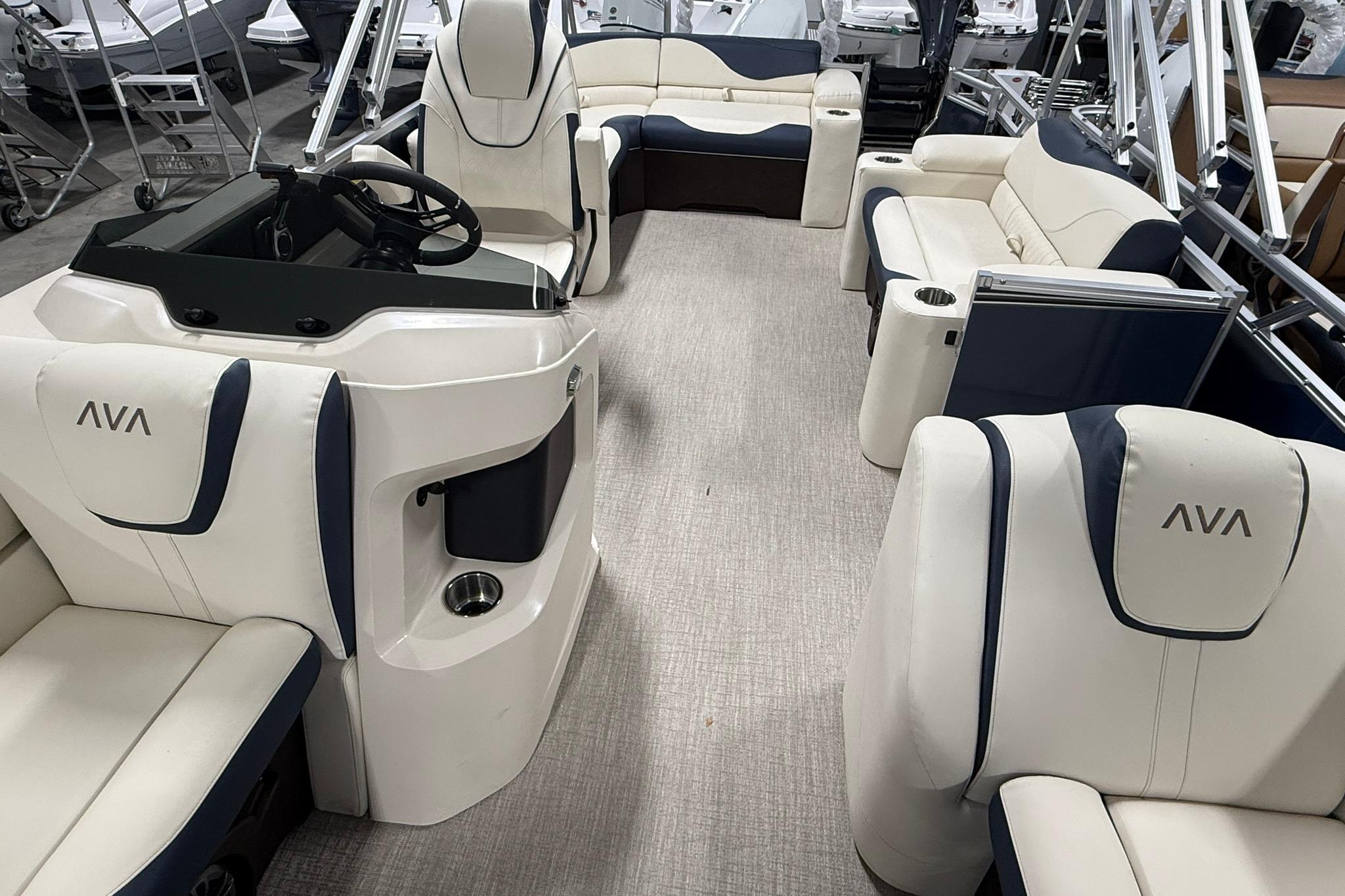 2026 Avalon LSZ Elite 21' pontoon boat interior with luxurious seating and modern helm.