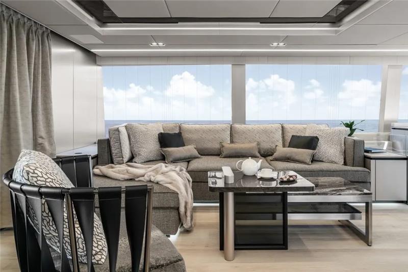 Luxurious interior of 2026 Sunreef 80 Sunreef Power yacht with elegant seating and ocean view.