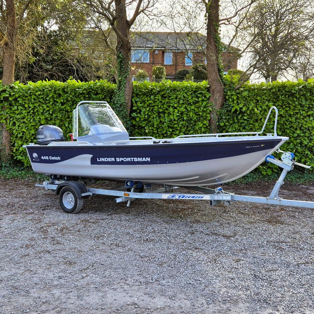 2023 Linder Sportsman 445 Catch boat on trailer, parked outdoors.