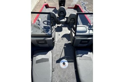 2026 Tracker Pro Guide V-175 Combo boat interior with seating and steering console.