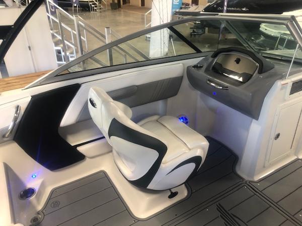 2023 Chaparral 21 Surf boat interior with modern helm and seating.