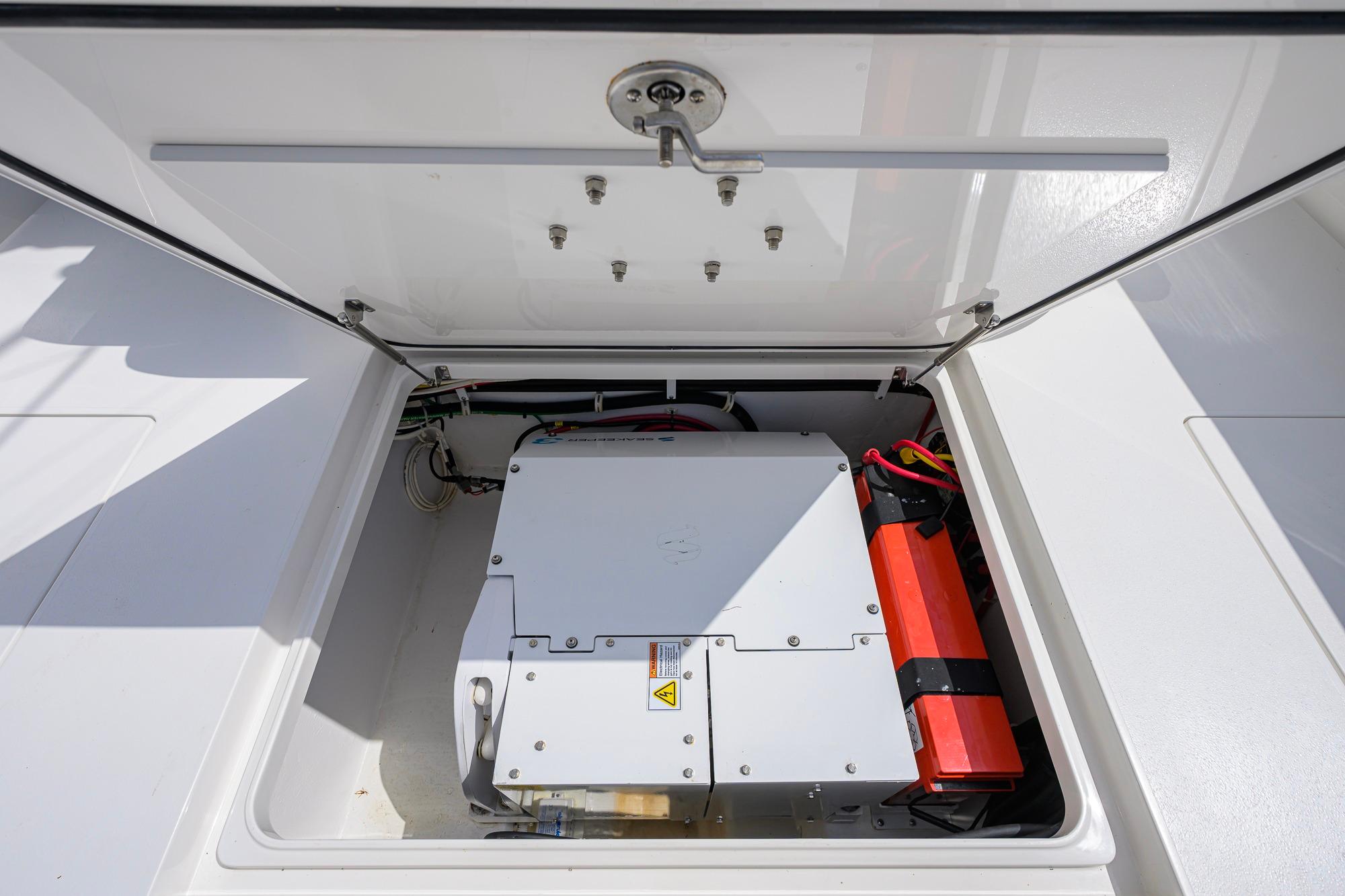 2020 Valhalla Boatworks V-41 electrical compartment with battery and wiring.